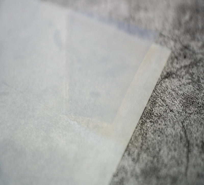 Close up image of our transparent gloss inkjet printable with a permanent adhesive